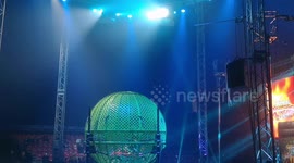 Motorbike riders dazzle the audiences at Circus Extreme as Motorbikes fly high in the sky. The event is being held in Shepherds Bush