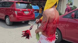 Christian devotee performs bloody ritual of self-flagellation on Good Friday in San Fernando, Philippines
