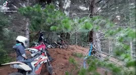 Sweet dirt bike jump through the trees enduro mx ktm double 300 tpi