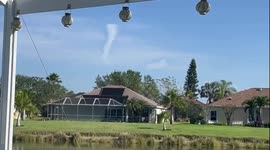Tornado shaped funnel appears out-of-thin-air in a Florida neighborhood!!