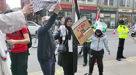 Palestinian solidarity campaign showing their tradition Palestinians dance protest against the Israeli raid on al-Aqsa mosque in London, UK