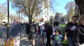 Visitors queue outside Westminster Abbey for Easter Day Evensong on Sunday 9 April 2023