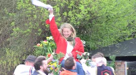 Bizarre British Easter tradition in Greenwich sees men lift women above their HEAD on a CHAIR