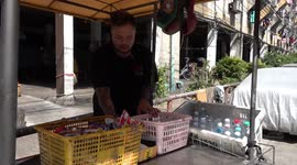 Charitable food vendor hands out meals to city's poor in Bangkok