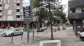 Solar bench with wifi and usb charge port. Paris suburb, Bois d'Arcy, Quartier de la Croix-Bonnet,11 april 2023. It is in a way the