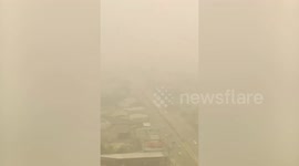 Buildings barely visible amid toxic haze in northern Thailand