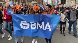 Thousands of junior doctors march to the Department of Health as they begin strike