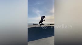 BMX rider crashes into girl on scooter
