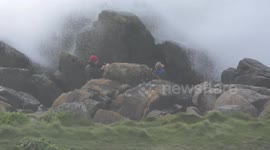 Man and two children escape dangerous waves as Storm Antoni makes landfall in St Ives, Cornwall