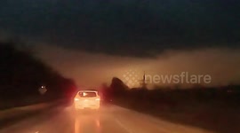 Sky glows after lightning strikes electrical transformer in Illinois