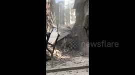 Residential building collapses in southern China