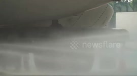 Planes spray water over 'world's most polluted city' to alleviate air pollution in northern Thailand