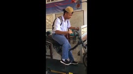 Imitation motorbike ride mishap: a comedic accident in Medan