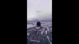 Chilling adventure: Divers have picnic among ice shards on frozen Lake Baikal in Siberia