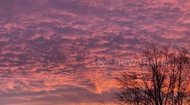 Watch this stunning sunrise over Montreal set the sky ablaze with colour.