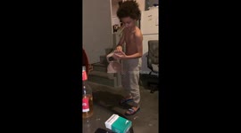Humorous scenes as teenager tries on bras that his mum ordered. He was so tickled in this video. At first he didnt know what it was
