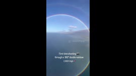 Stunning footage as photographers capture double rainbow in Hawaii from helicopter