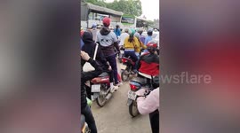 Rampaging cow rams motorcycle riders on road in Vietnam
