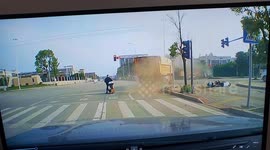 Burst tyre shockwave from truck knocks over electric scooter rider in China