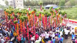 Devotees in southern India flock to worship Hindu goddess by covering themselves in sludge