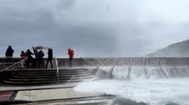 Storm Noa's strong tides splash Spain as waves lash passerbys on northern coast