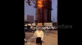 Outrage as Chinese woman films dance video at site of fire to gain social media attention