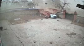 Severe windstorm devastates car shed, crushing parked vehicle in China