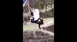 Incredible clip shows newlyweds bungee jump in bridal dress, suit