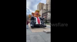 Donald Trump portrayed as massive inflatable rat