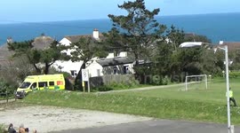 Take off. after The Air Ambulance attempting a dangerous landing on the playing fields at Port isaac in cornwall then waiting for the ambulance, thank god its not windy  3