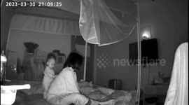Heartwarming moment infant helps pregnant mother relieve backache