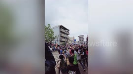 Frenzied locals race to catch cows rampaging through streets in brutal festival in the Philippines