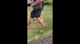 Man cannot control his laughter when slides slide up on leg *Hilarious Video*