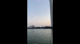 Sea windmills ready to get build and are moved on a special build ship to move them to ther location