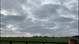 World war 2 Spitfire doing a low fly by at a airshow in the Netherlands