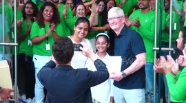 Touching moment customer presents Tim Cook with vintage computer as Apple open first store in India