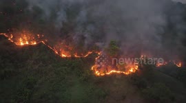 Forest fire rips through mountain amid worsening air quality in Thailand