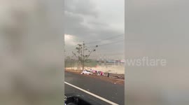 Market stalls blown over by sudden tropical storm in Thailand