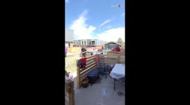 Curious kids turn into treasure hunters as they search for Easter Eggs in the yard