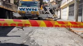 Falling crane scares residents of a street in Sao Paulo, Brazil