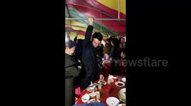 Guests unite to save tent from strong winds at birthday celebration in China