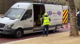 King Charles coronation: workers install huge crowns on The Mall