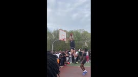 INSANE moment basketball player is thrown alley-oop and performs 360 dunk