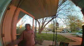 Scary moment neighbour scrambles and screams to rescue family from fire in US