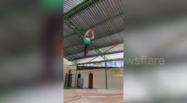 Athlete plunges headfirst while jumping on springy rope in Brazil