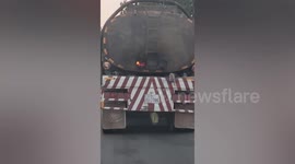 Fire burns inside moving tanker in Cambodia