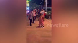 Lively grandma copies coyote dancers twerking onstage