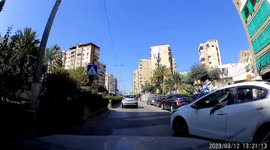 Close Call: Careless Taxi Driver Decides To Cut-Off Oncoming Vehicle