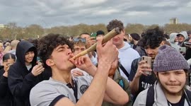 Cannabis smokers celebrate with an oversized spiff during annual 4/20 event in Hyde Park