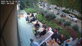 Quick-thinking restaurateur catches suddenly collapsing glass door